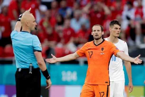 Referee Sergei Karasev, Daley Blind of Holland during the EURO match between Holland v Czech Republic at the Puskas Arena on June 27, 2021 in...