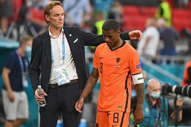 Netherlands' midfielder Georginio Wijnaldum reacts after losing the UEFA EURO 2020 round of 16 football match between the Netherlands and the Czech...