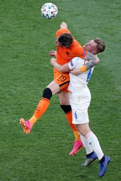Netherlands' forward Wout Weghorst fights for the ball with Czech Republic's defender Tomas Kalas during the UEFA EURO 2020 round of 16 football...