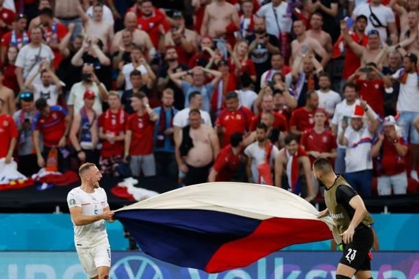 Czech Republic's defender Vladimir Coufal and Czech Republic's goalkeeper Tomas Koubek celebrate at the end of the UEFA EURO 2020 round of 16...