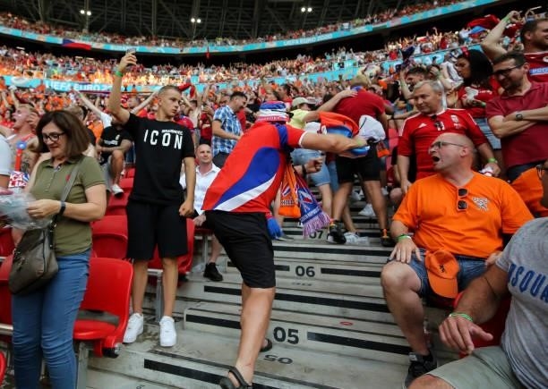 Fans watch the UEFA Euro 2020 Championship Round of 16 match between Netherlands and Czech Republic at Puskas Arena on June 27, 2021 in Budapest,...