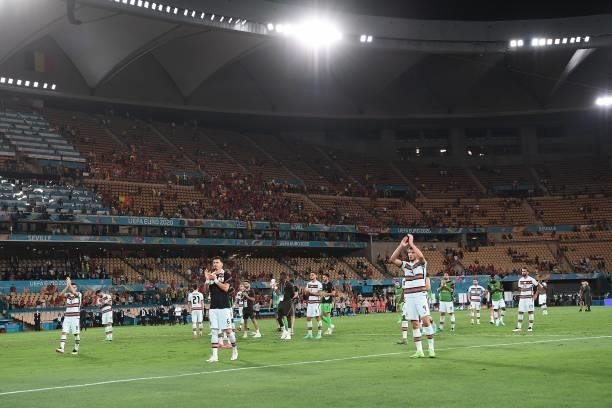 Portugal's players acknowledge fans at the end of the UEFA EURO 2020 round of 16 football match between Belgium and Portugal at La Cartuja Stadium in...
