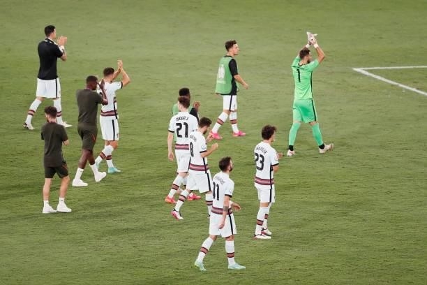 Portugal's players greet their supporters after the UEFA EURO 2020 round of 16 football match between Belgium and Portugal at La Cartuja Stadium in...