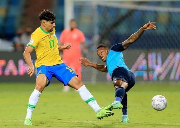 Lucas Paqueta of Brazil competes for the ball with Pervis Estupiñán of Ecuador during the match between Brazil and Ecuador as part of Conmebol Copa...