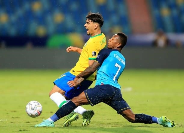 Lucas Paqueta of Brazil competes for the ball with Pervis Estupiñán of Ecuador during the match between Brazil and Ecuador as part of Conmebol Copa...