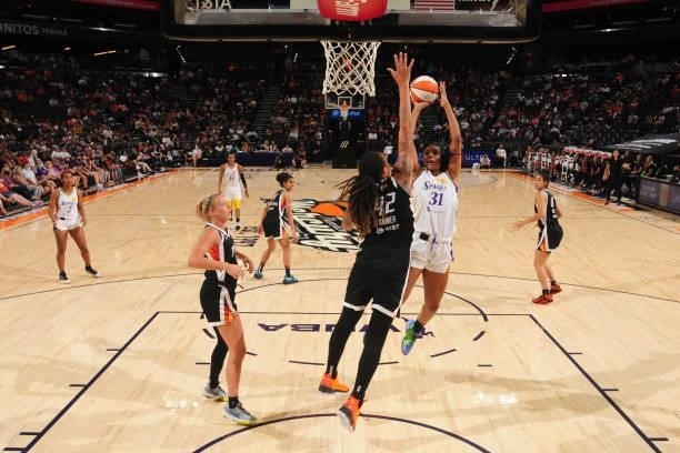 Kristine Anigwe of the Los Angeles Sparks shoots the ball against the Phoenix Mercury on June 27, 2021 at Phoenix Suns Arena in Phoenix, Arizona....