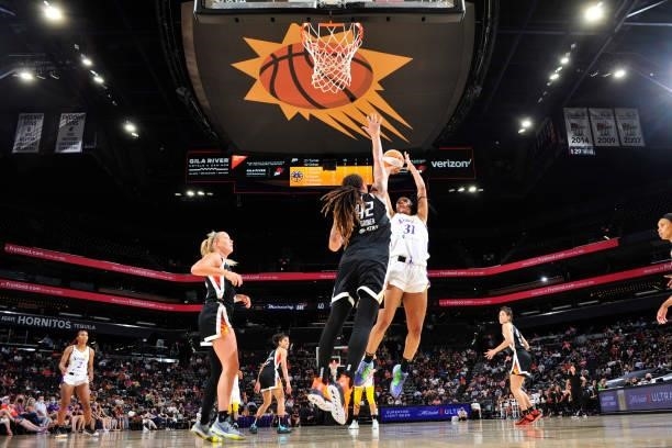 Kristine Anigwe of the Los Angeles Sparks shoots the ball against the Phoenix Mercury on June 27, 2021 at Phoenix Suns Arena in Phoenix, Arizona....