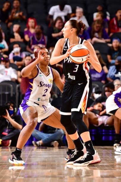 Diana Taurasi of the Phoenix Mercury looks to pass the ball against the Los Angeles Sparks on June 27, 2021 at Phoenix Suns Arena in Phoenix,...