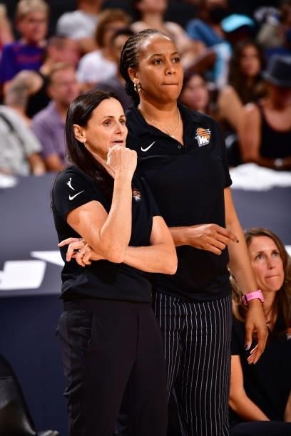 Coaches, Sandy Brondello and Chasity Melvin of the Phoenix Mercury look on during the game against the Los Angeles Sparks on June 27, 2021 at Phoenix...