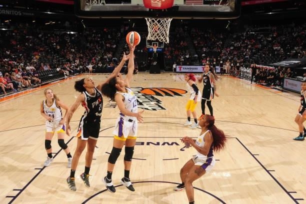 Nia Coffey of the Los Angeles Sparks grabs the rebound against the Phoenix Mercury on June 27, 2021 at Phoenix Suns Arena in Phoenix, Arizona. NOTE...
