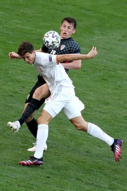 Ante Budimir of Croatia and Pau Torres of Spain during the UEFA Euro 2020 Championship Round of 16 match between Croatia and Spain at Parken Stadium...