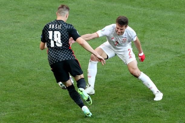Mislav Orsic of Croatia and Cesar Azpilicueta of Spain during the UEFA Euro 2020 Championship Round of 16 match between Croatia and Spain at Parken...