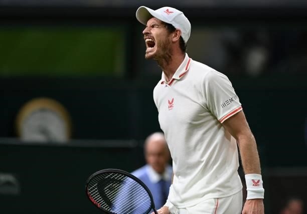 Britain's Andy Murray reacts against Georgia's Nikoloz Basilashvili in the fourth set of their men's singles first round match on the first day of...