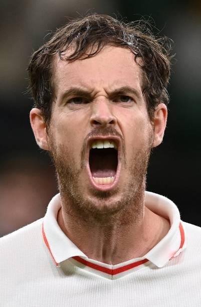 Britain's Andy Murray celebrates winning against Georgia's Nikoloz Basilashvili during their men's singles first round match on the first day of the...