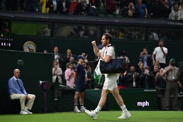 Britain's Andy Murray leaves the court after beating Georgia's Nikoloz Basilashvili in their men's singles first round match on the first day of the...