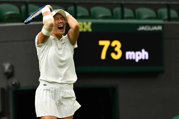 Player Kristie Ahn celebrates winning against Britain's Heather Watson in their women's singles first round match of the 2021 Wimbledon Championships...