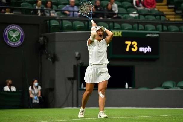 Player Kristie Ahn celebrates winning against Britain's Heather Watson during their women's singles first round match of the 2021 Wimbledon...