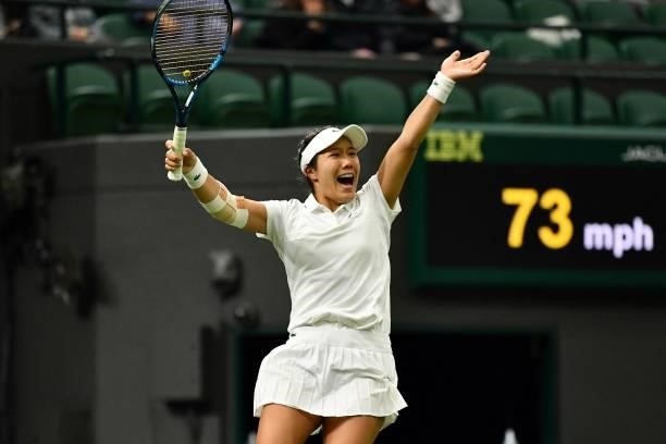 Player Kristie Ahn celebrates winning against Britain's Heather Watson during their women's singles first round match of the 2021 Wimbledon...