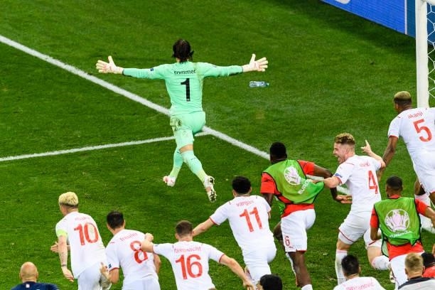 Goalkeeper Yann Sommer of Switzerland celebrating with his teammates after defending a penalty kicked by Kylian Mbappe of France during the UEFA Euro...