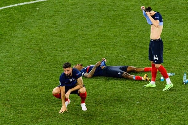 French players react after been defeated by Switzerland during the UEFA Euro 2020 Championship Round of 16 match between France and Switzerland at...