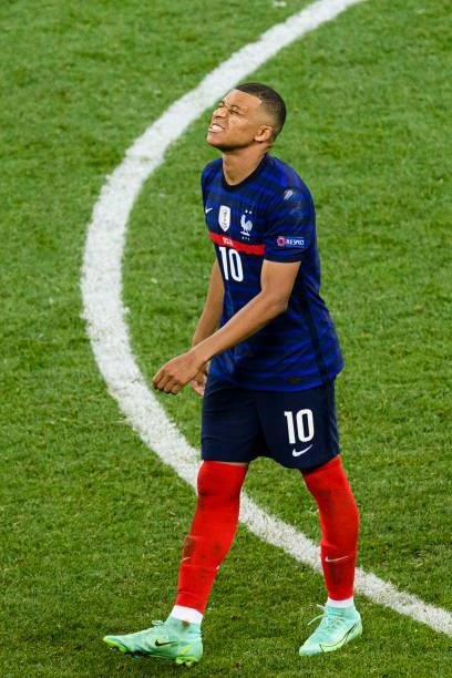 Kylian Mbappe of France reacts after failing on a penalty shot during the UEFA Euro 2020 Championship Round of 16 match between France and...