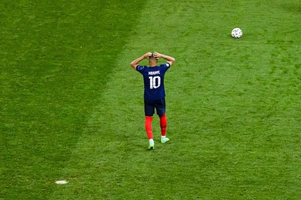 Kylian Mbappe of France reacts after goalkeeper Yann Sommer of Switzerland blocked Mbappe's free kick during the UEFA Euro 2020 Championship Round of...