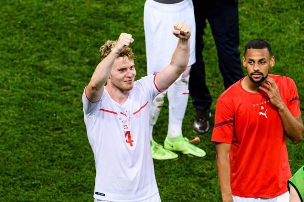 Nico Elvedi of Switzerland celebrates after defeating France during the UEFA Euro 2020 Championship Round of 16 match between France and Switzerland...