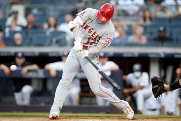 Shohei Ohtani of the Los Angeles Angels hits a home run during the game between the Los Angeles Angels and the New York Yankees at Yankee Stadium on...