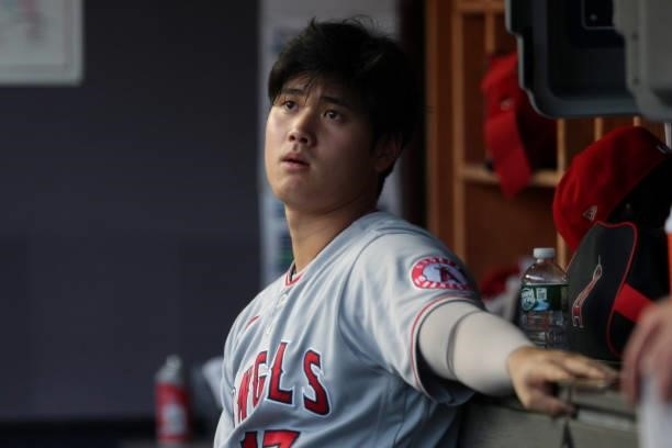 Shohei Ohtani of the Los Angeles Angels looks on during the game between the Los Angeles Angels and the New York Yankees at Yankee Stadium on Monday,...