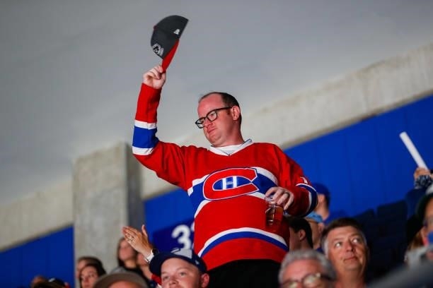 Fan of the Montreal Canadiens cheers on the team against the Tampa Bay Lightning during the third period in Game One of the Stanley Cup Final of the...