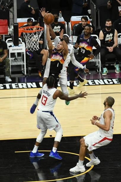 Devin Booker of the Phoenix Suns shoots the ball against the LA Clippers during Game 5 of the Western Conference Finals of the 2021 NBA Playoffs on...