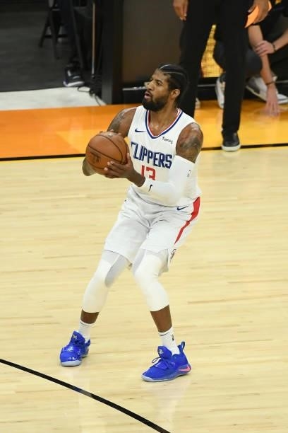 Paul George of the LA Clippers shoots a three point basket against the Phoenix Suns during Game 5 of the Western Conference Finals of the 2021 NBA...