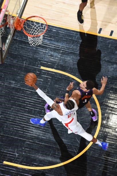 Paul George of the LA Clippers drives to the basket during the game against the Phoenix Suns during Game 5 of the Western Conference Finals of the...
