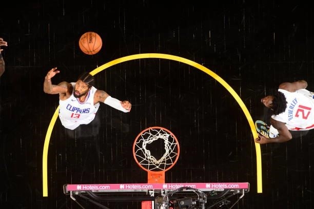Paul George of the LA Clippers rebounds the ball against the Phoenix Suns during Game 5 of the Western Conference Finals of the 2021 NBA Playoffs on...