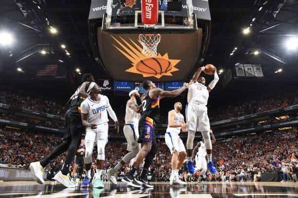 Paul George of the LA Clippers rebounds the ball during the game against the Phoenix Suns during Game 5 of the Western Conference Finals of the 2021...