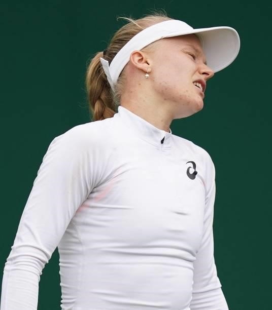 Britain's Harriet Dart loses a point to Belgium's Elise Mertens during their women's singles first round match on the second day of the 2021...
