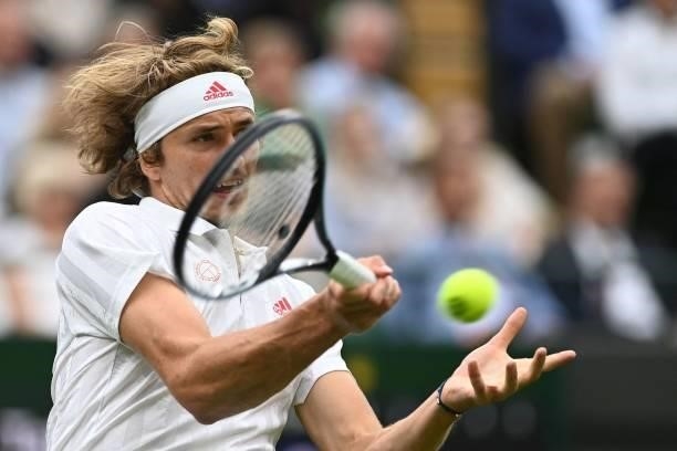 Germany's Alexander Zverev returns to Netherland's Tallon Griekspoor during their men's singles first round match on the second day of the 2021...