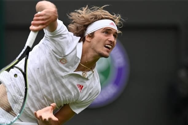 Germany's Alexander Zverev serves to Netherland's Tallon Griekspoor during their men's singles first round match on the second day of the 2021...
