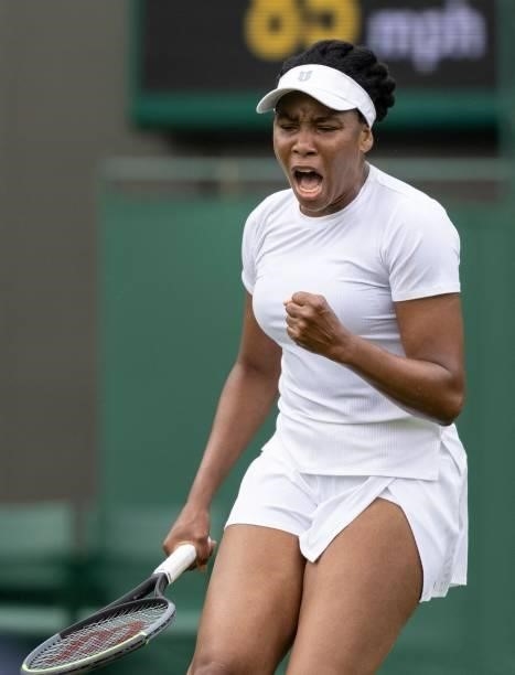Player Venus Williams celebrates her win over Romania's Mihaela Buzarnescu during their women's singles first round match on the second day of the...