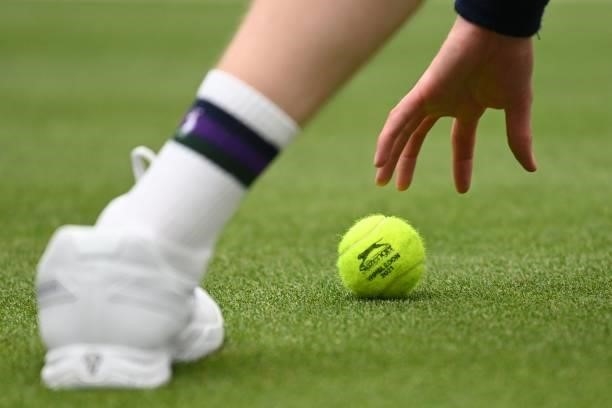 Ball boy collects a ball during a men's singles first round match between Netherland's Tallon Griekspoor and Germany's Alexander Zverev on the second...