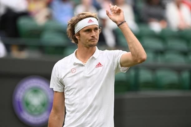 Germany's Alexander Zverev reacts while playing Netherland's Tallon Griekspoor during their men's singles first round match on the second day of the...