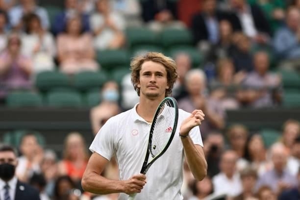Germany's Alexander Zverev celebrates after defeating Netherland's Tallon Griekspoor during their men's singles first round match on the second day...