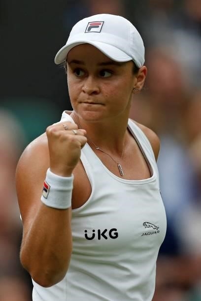 Australia's Ashleigh Barty celebrates winning a point against Spain's Carla Suarez Navarro during their women's singles first round match on the...