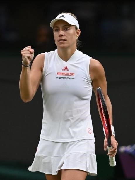 Germany's Angelique Kerber celebrates her win against Serbia's Nina Stojanovic during their women's singles first round match on the second day of...
