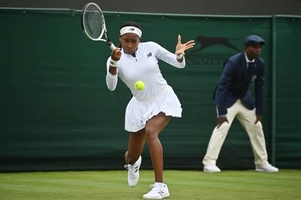 Player Coco Gauff returns to Britain's Francesca Jones during their women's singles first round match on the second day of the 2021 Wimbledon...