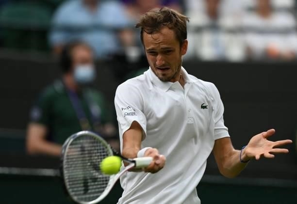 Russia's Daniil Medvedev lunges for a return to Germany's Jan-Lennard Struff during their men's singles first round match on the second day of the...