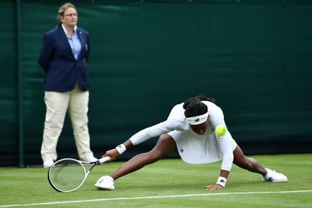Player Coco Gauff returns to Britain's Francesca Jones during their women's singles first round match on the second day of the 2021 Wimbledon...