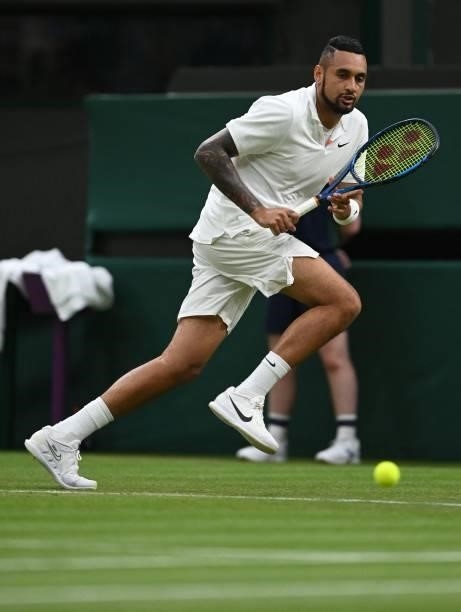Australia's Nick Kyrgios chases the ball for a return to France's Ugo Humbert during their men's singles first round match on the second day of the...