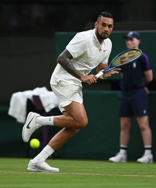 Australia's Nick Kyrgios chases the ball for a return to France's Ugo Humbert during their men's singles first round match on the second day of the...