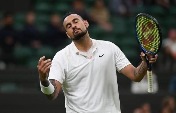 Australia's Nick Kyrgios reacts to his return being ruled out during play against France's Ugo Humbert at their men's singles first round match on...